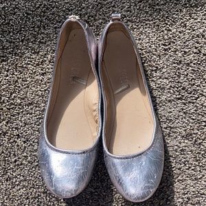 Size 9 silver flats, have some wear and tear